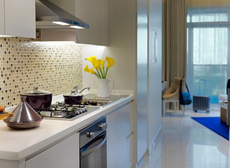 Damac Maison The Vogue Dubai Bagian luar foto A typical kitchen