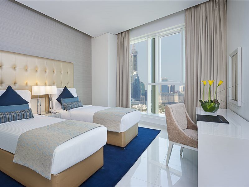 Damac Maison The Vogue Dubai Bagian luar foto A guest room at the Address Downtown Hotel