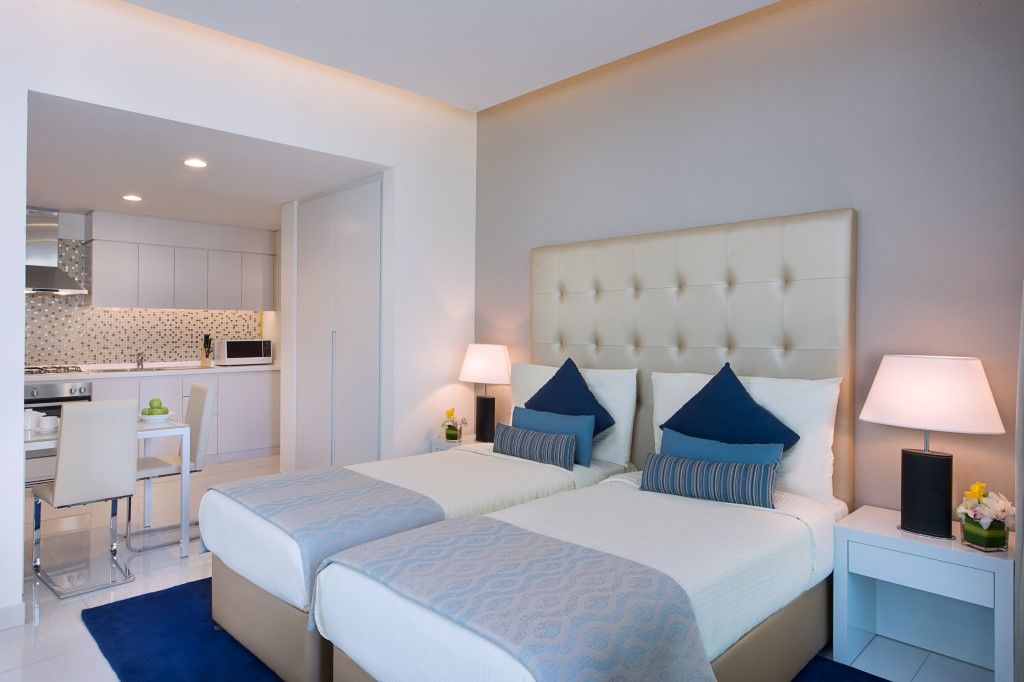 Damac Maison The Vogue Dubai Bagian luar foto A bedroom at the hotel