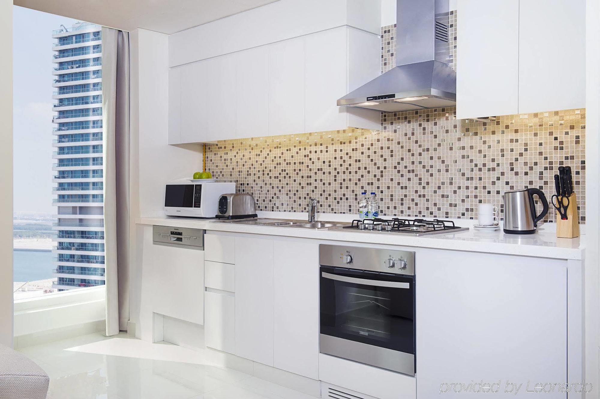 Damac Maison The Vogue Dubai Bagian luar foto A modern kitchen