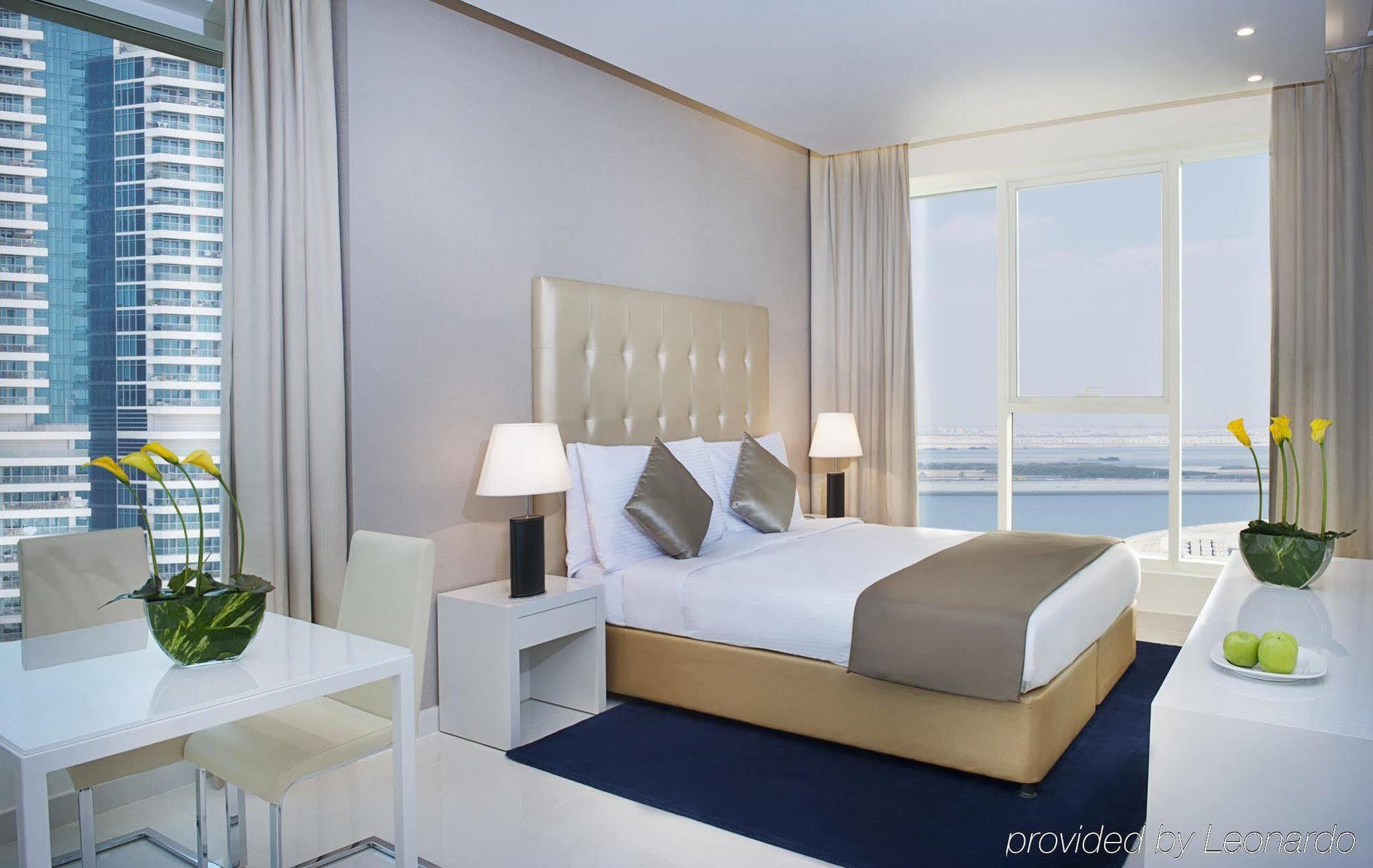 Damac Maison The Vogue Dubai Bagian luar foto A bedroom at the Address Downtown Hotel