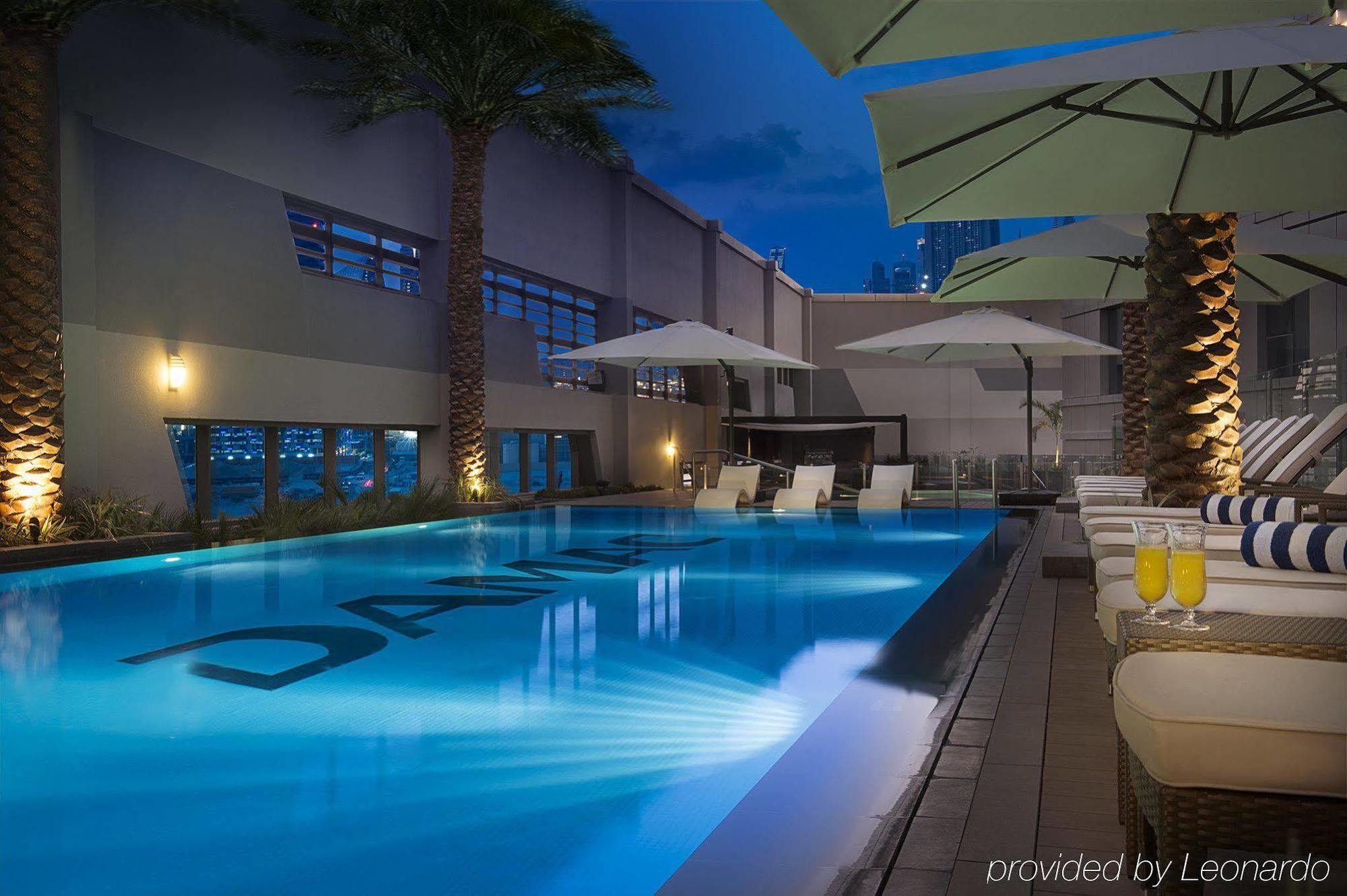 Damac Maison The Vogue Dubai Bagian luar foto The pool at the hotel