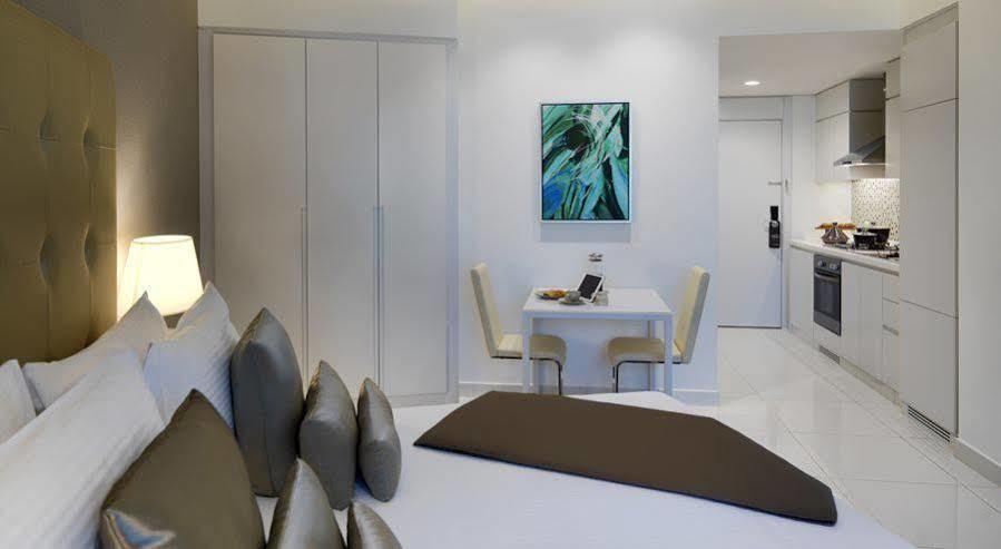 Damac Maison The Vogue Dubai Bagian luar foto A typical apartment interior