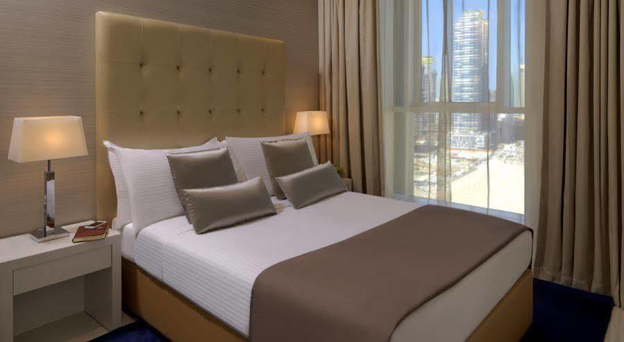 Damac Maison The Vogue Dubai Bagian luar foto A bedroom