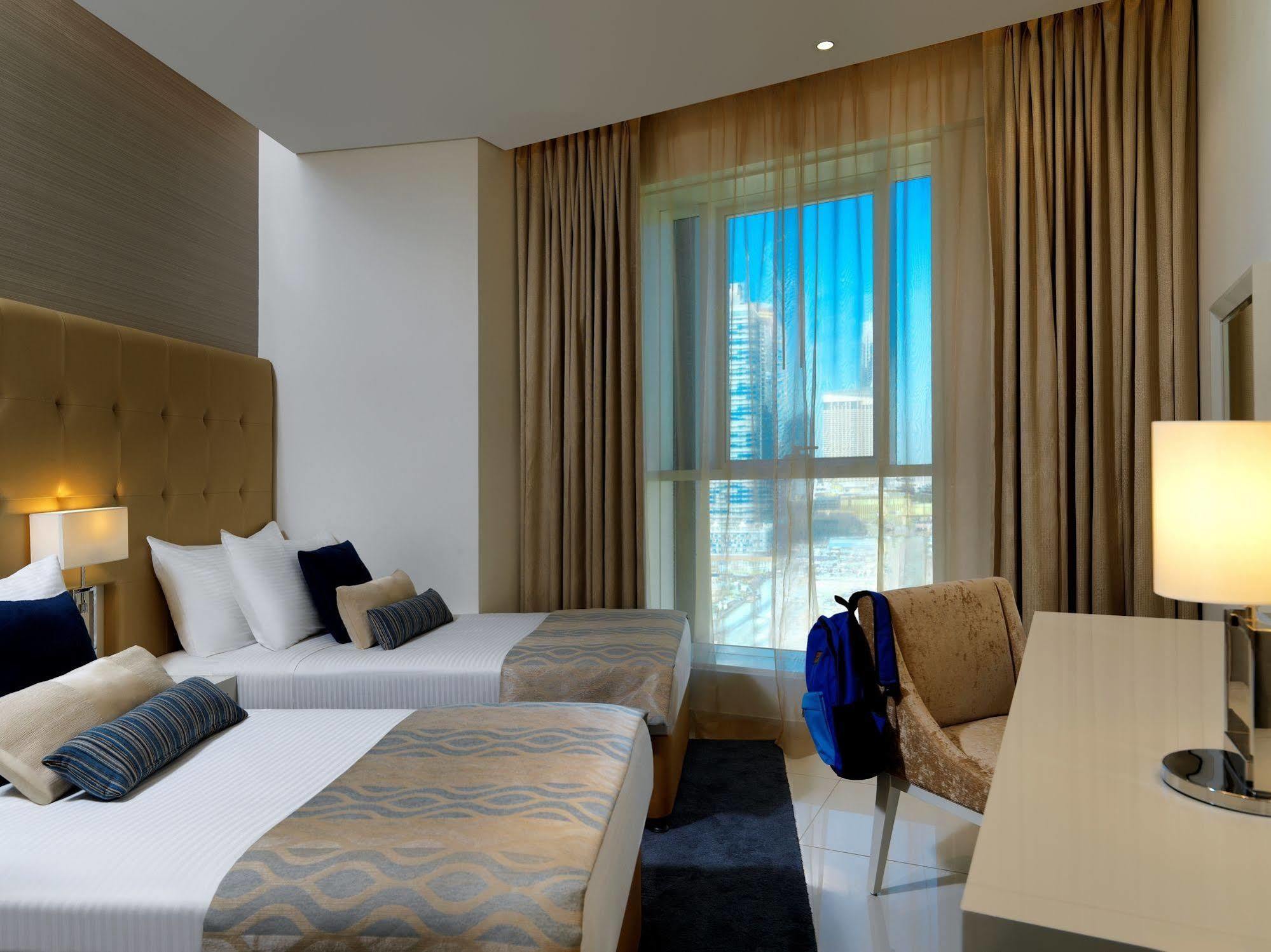 Damac Maison The Vogue Dubai Bagian luar foto A room at the hotel